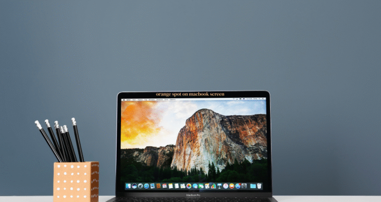 orange spot on macbook screen
