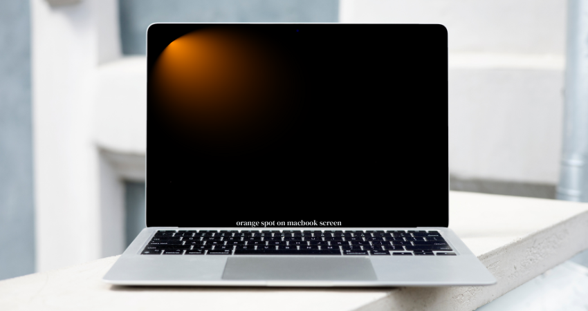 orange spot on macbook screen